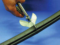2. Cut the strap to desired length. Use Gelbau's special scissor or a serrated saw for best cut