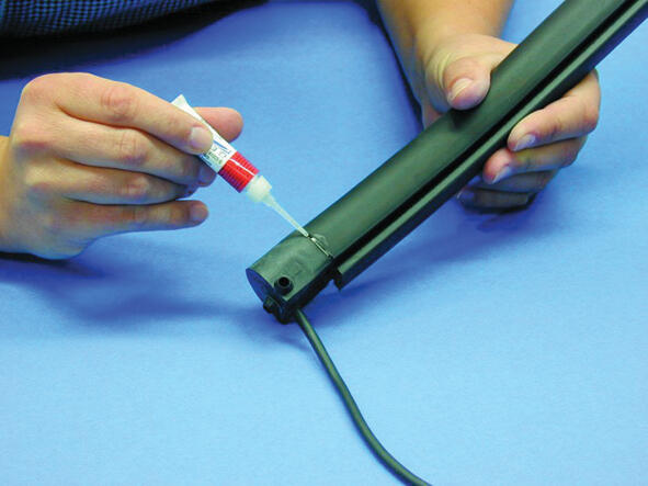 16. Apply a layer of glue over the splice  between gable plug and terminal strap to make it extra durable