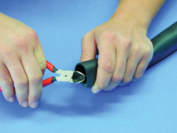 5. Cut the copper wire along the strap.